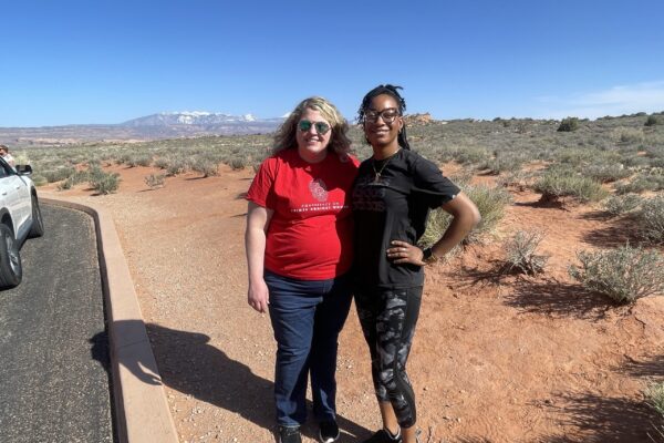 Director and Program Manager of National Training Center on Crimes Against Women (NTC) and Institute for Coordinated Community Response (ICCR), Lacy Hensley and Myia Pridgen, visit Arches National Park near cohort site in Moab, Utah.