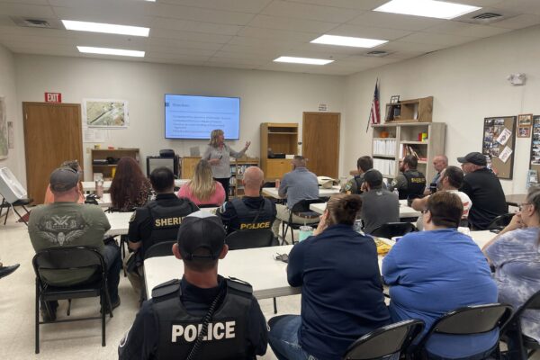 Retired Corporal, Angela Weekes, provides training in Thompson Falls, Montana, on trauma-informed investigations.